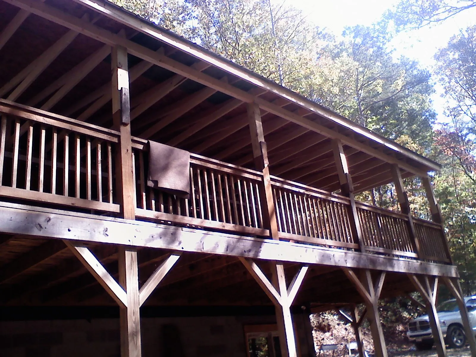 Timber framing under a new elevated porch and deck — Roof Leak Repair in Alburnett by Roofing Brothers
